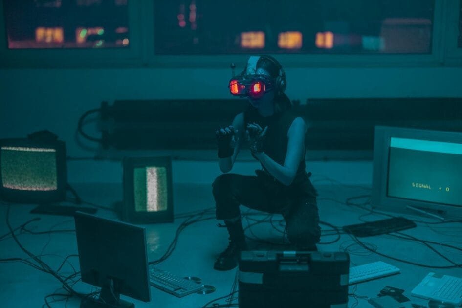 a woman in a tank top using a vr headset