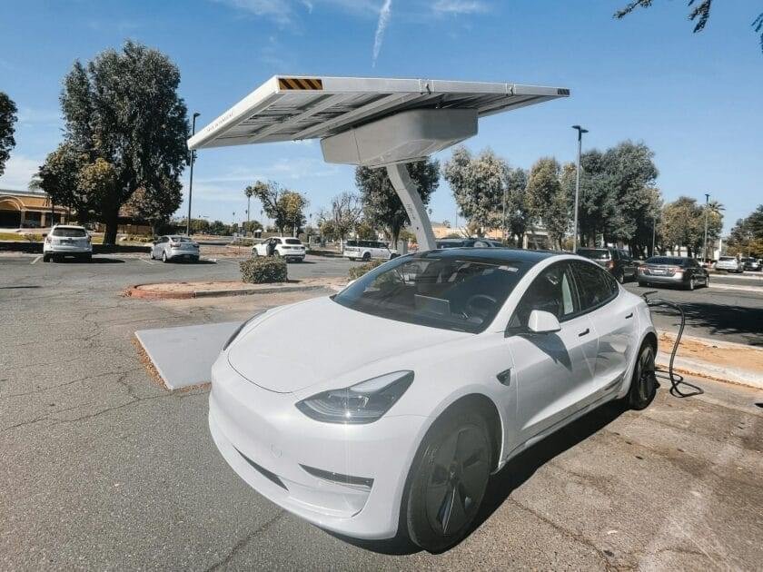 white electric car charging